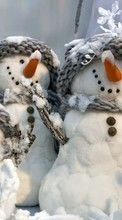 Télécharger une image Bonhommes de neige,Nouvelle Année,Fêtes pour le portable gratuitement.