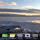 Outre le fond d'écran animé La force de la vie pour Android téléchargez l'apk gratuit de screensaver Vagues sur les rochers .